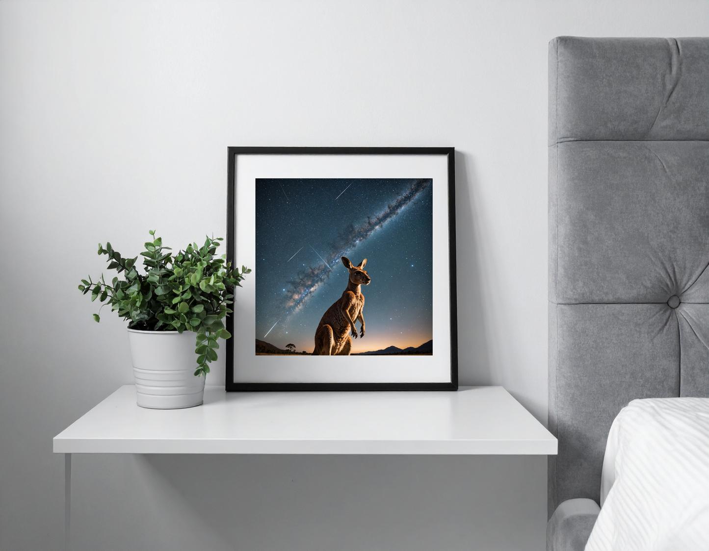Kangaroo with its head facing the sky full of Stars and a Shooting star