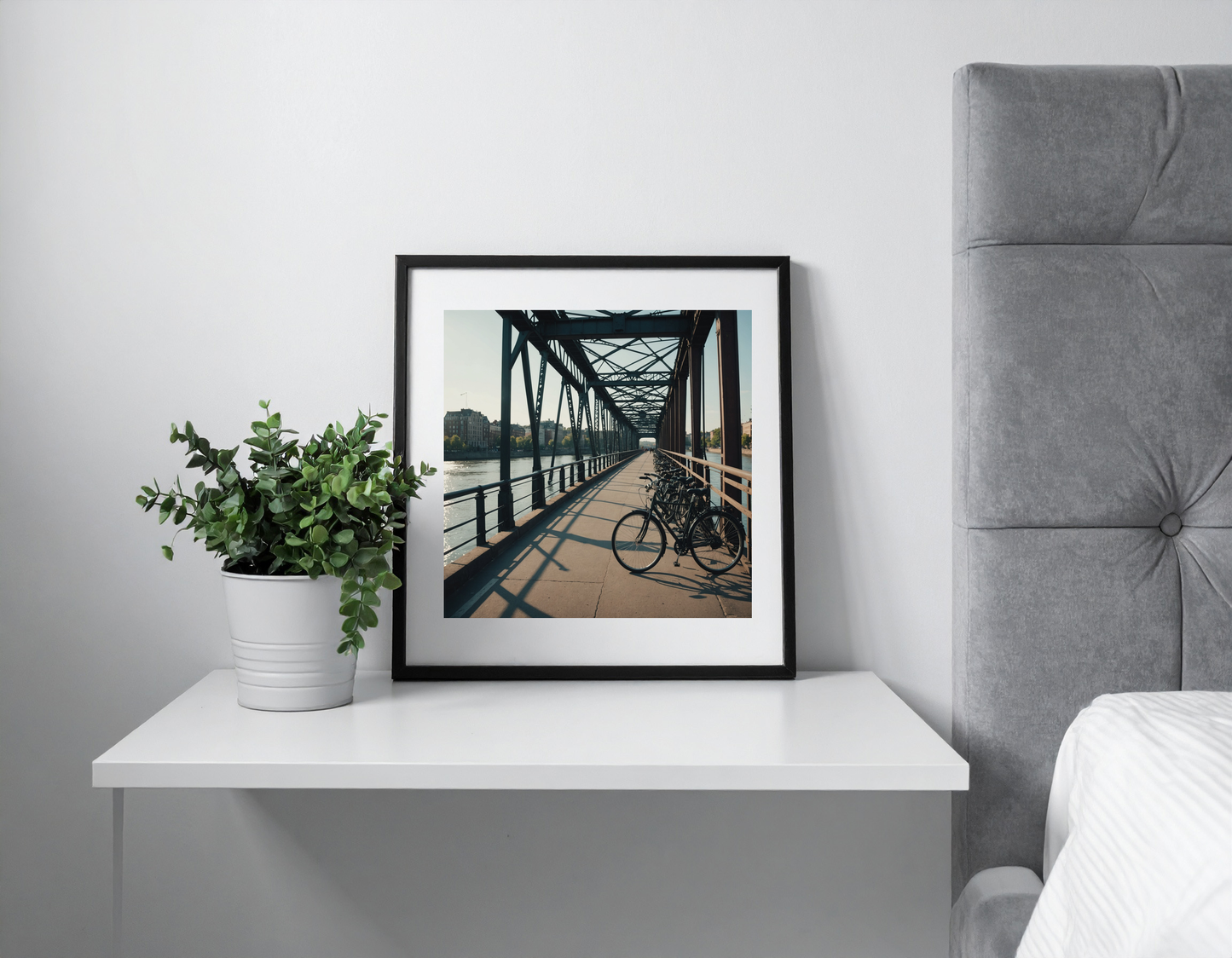 Bicycle bridge over river in city