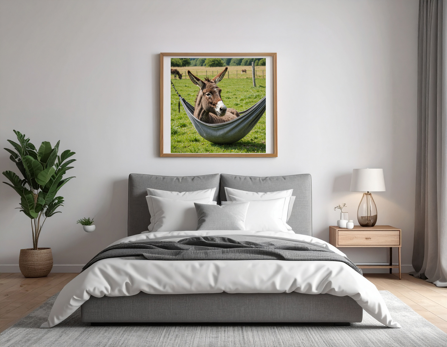 Donkey doing siesta in a hammok in a meadow with closed eyes